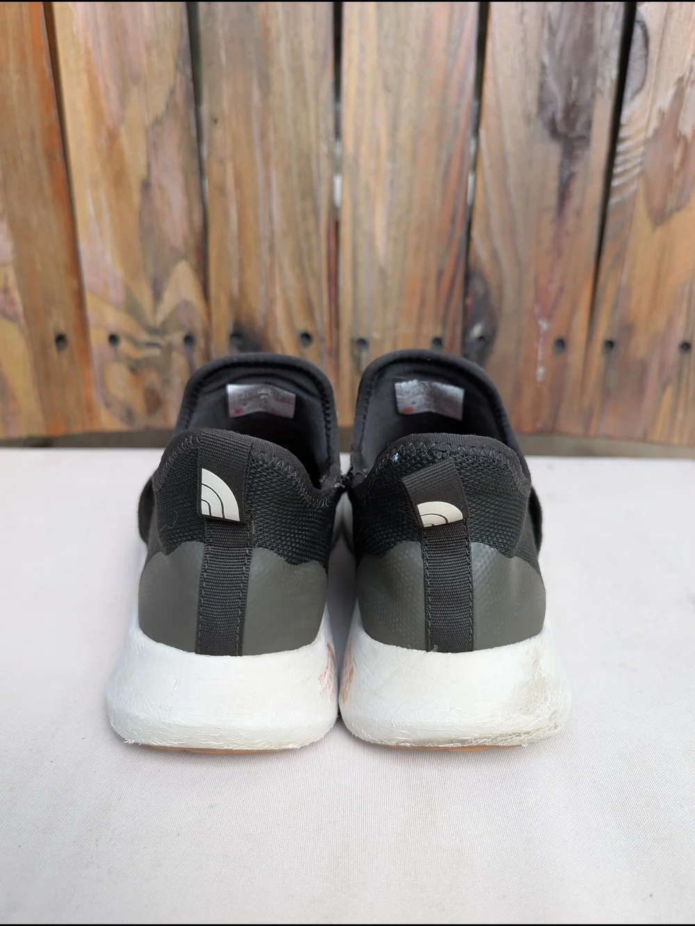 The North Face Women’s Slip-On Athletic Sneakers in Olive Green and White